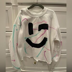 Prince Peter, sweatshirt.  White with pink&teal splatter and black smiley face.